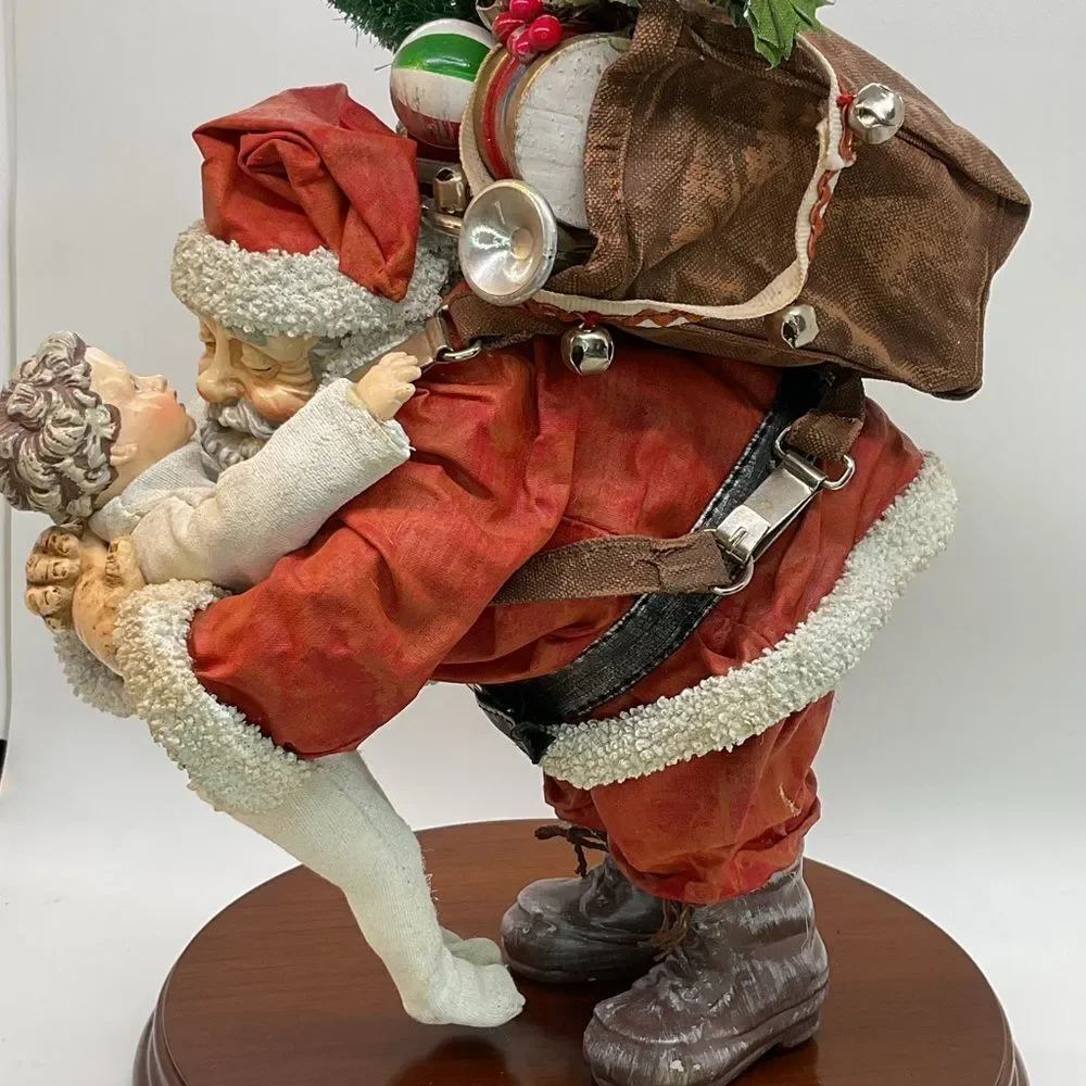 Clothtique Santa and Child Sculpture - Saturday Evening Post